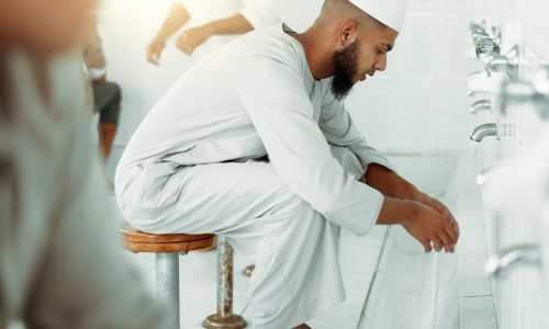 Muslim, hygiene and men washing before prayer in bathroom for purity, and cleaning ritual. Islamic,.